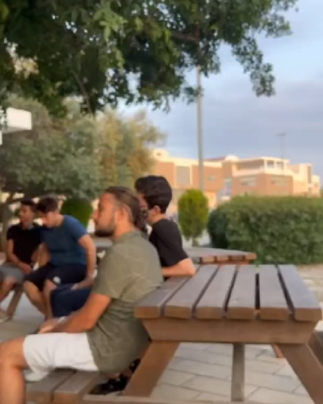 Club members meeting outdoors