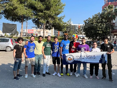 Game jam group photo with the club banner